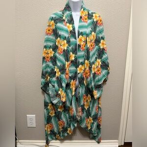 Multicolored Women’s duster , Brand is Mikey and Joey and the size is an XL